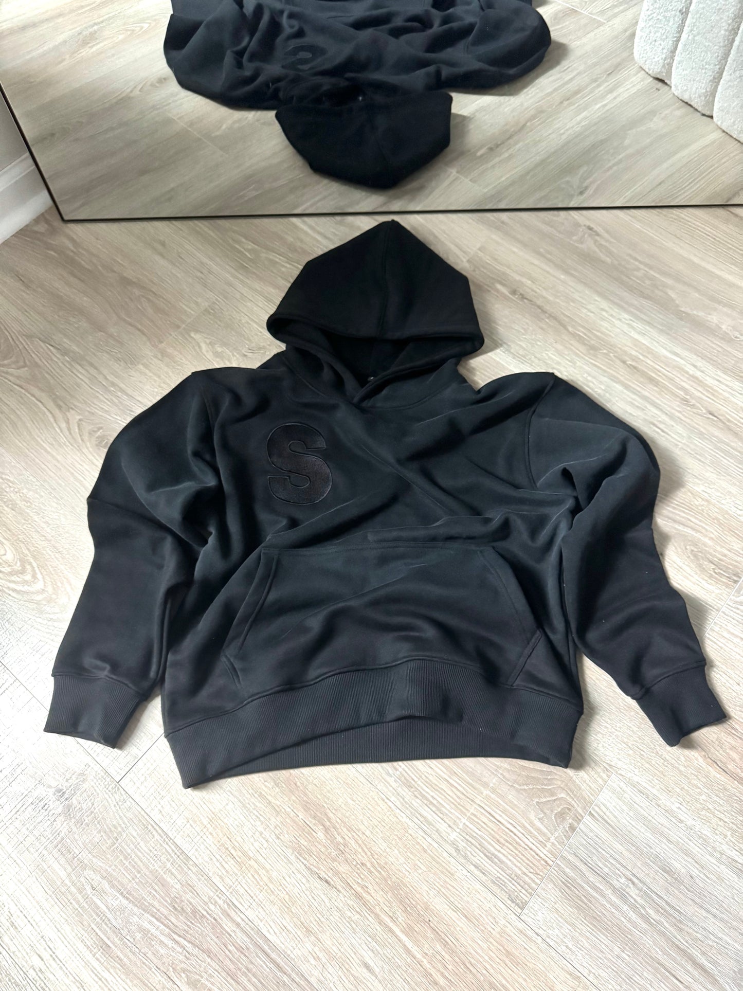 Black S logo hoodie